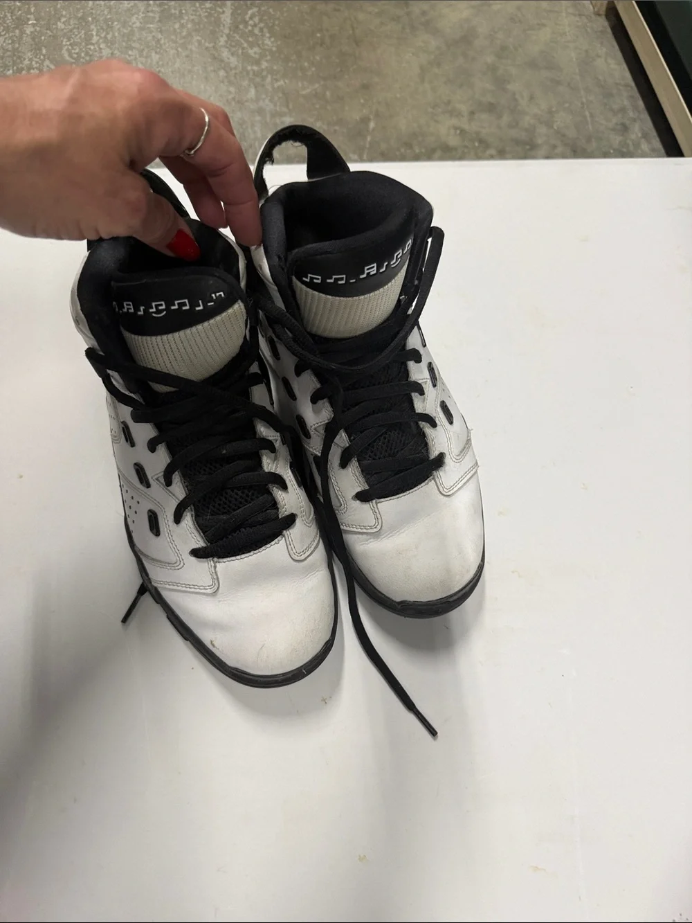White and Black High-Top Athletic Sneakers